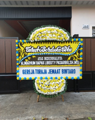 Papan Bunga Duka di Air Rami